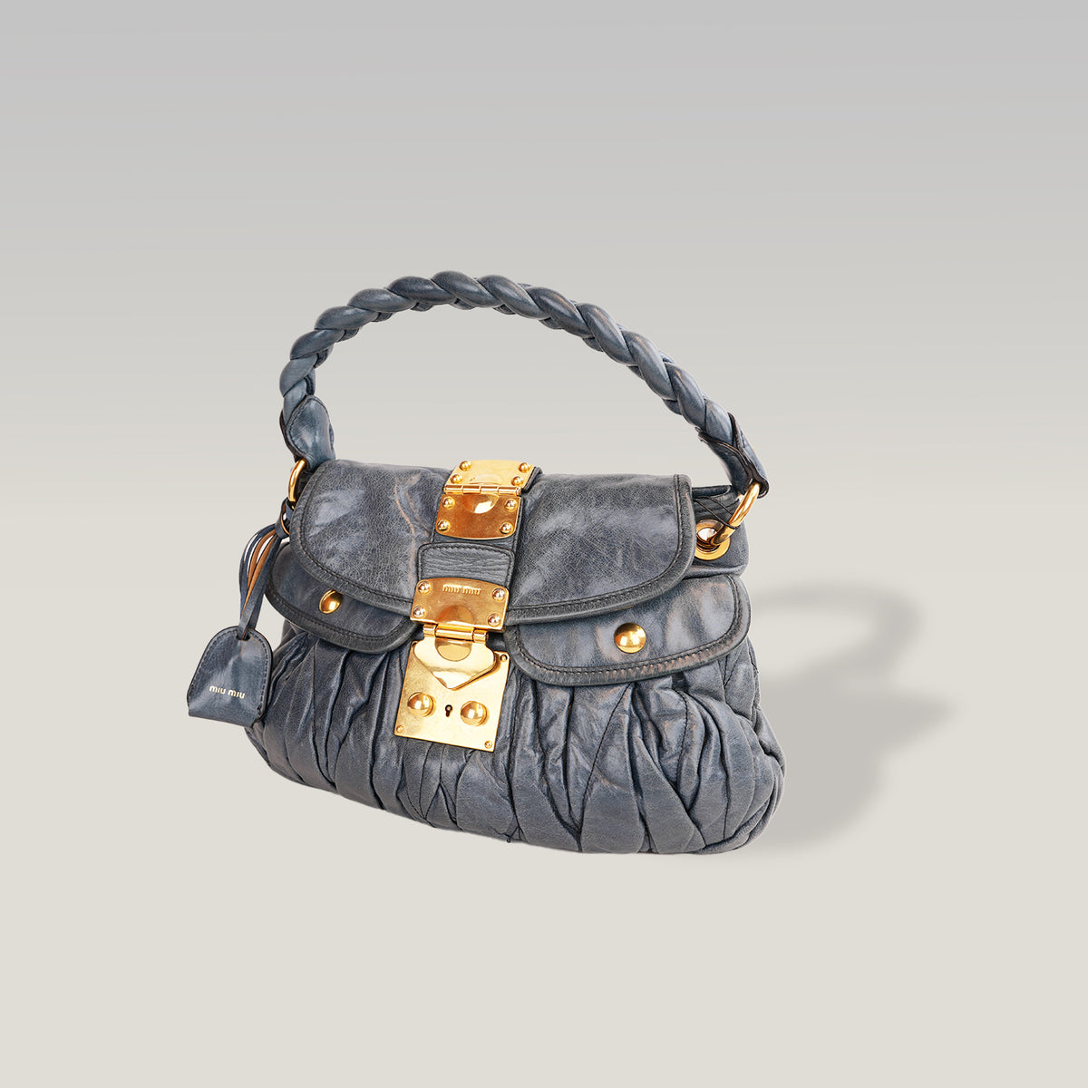 Miu Miu Coffer Matelassé Borsa a Mano in Pelle di Agnello Blu Scuro con Hardware Dorato