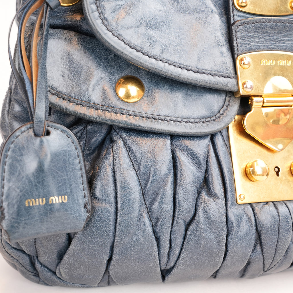 Miu Miu Coffer Matelassé Borsa a Mano in Pelle di Agnello Blu Scuro con Hardware Dorato