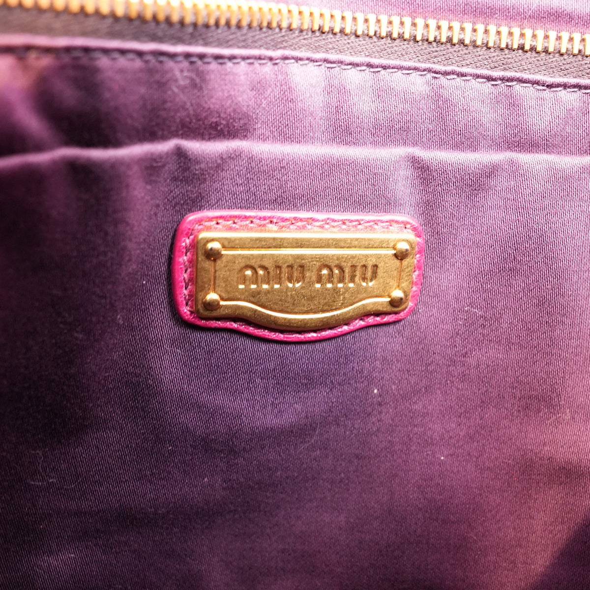 Miu Miu Vitello Bow Bag Borsa a Mano in Pelle Cerata Rosa Fucsia con Fiocchi Laterali e Dettagli Dorati