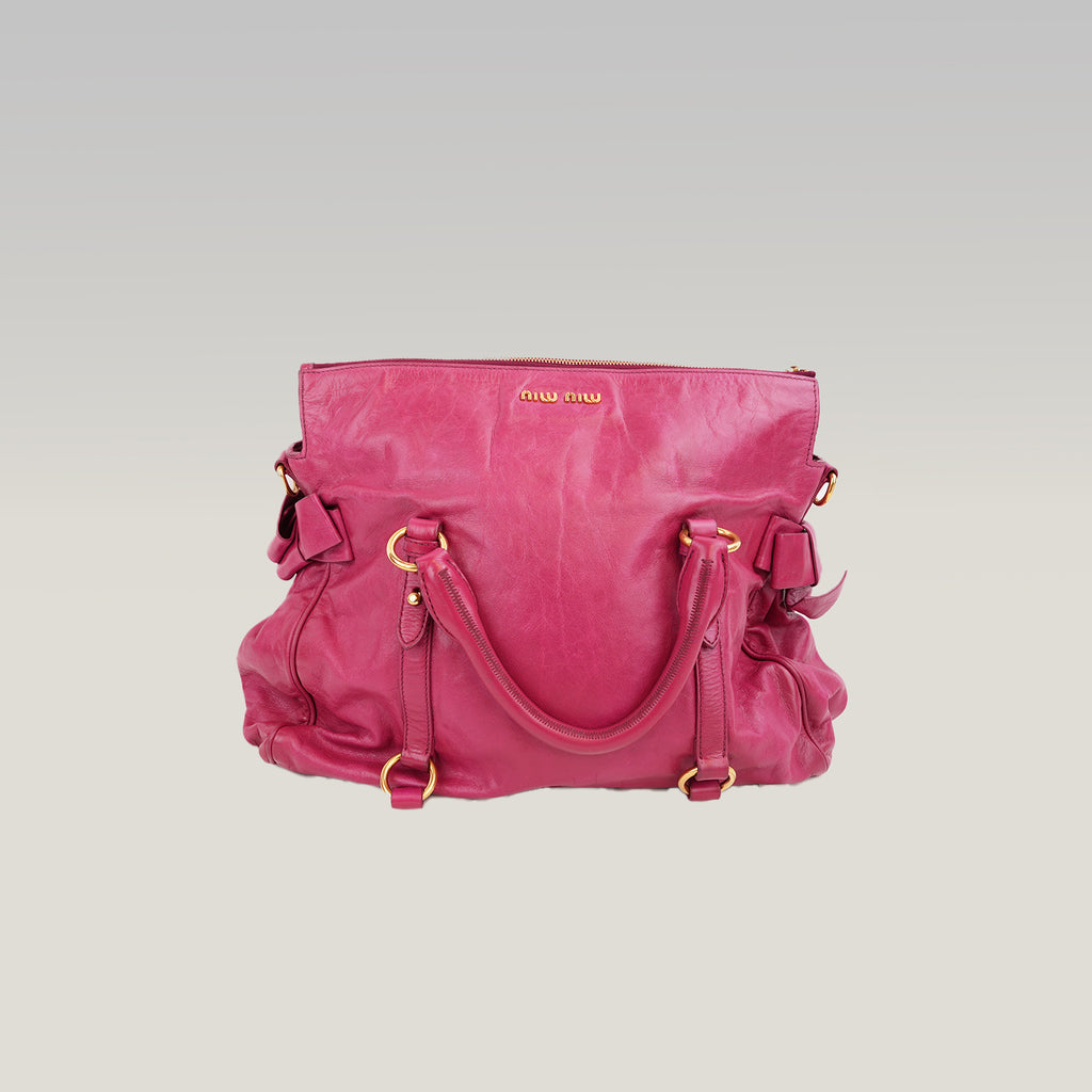 Miu Miu Vitello Bow Bag Borsa a Mano in Pelle Cerata Rosa Fucsia con Fiocchi Laterali e Dettagli Dorati