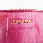 Miu Miu Vitello Bow Bag Borsa a Mano in Pelle Cerata Rosa Fucsia con Fiocchi Laterali e Dettagli Dorati