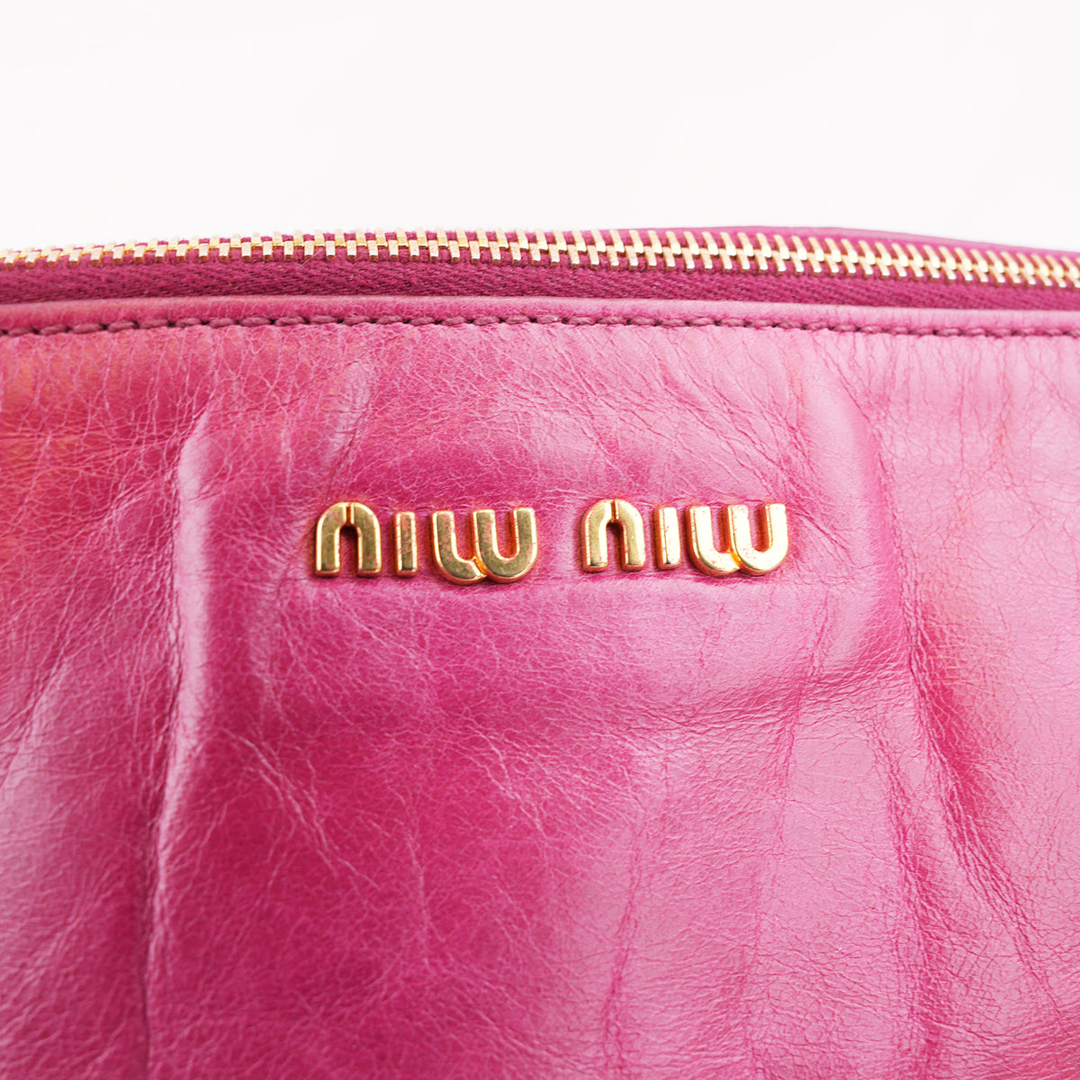 Miu Miu Vitello Bow Bag Borsa a Mano in Pelle Cerata Rosa Fucsia con Fiocchi Laterali e Dettagli Dorati