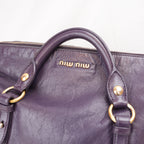 Miu Miu Vitello Lux Bow Borsa a Mano in Pelle Viola Effetto Vintage con Dettagli Dorati