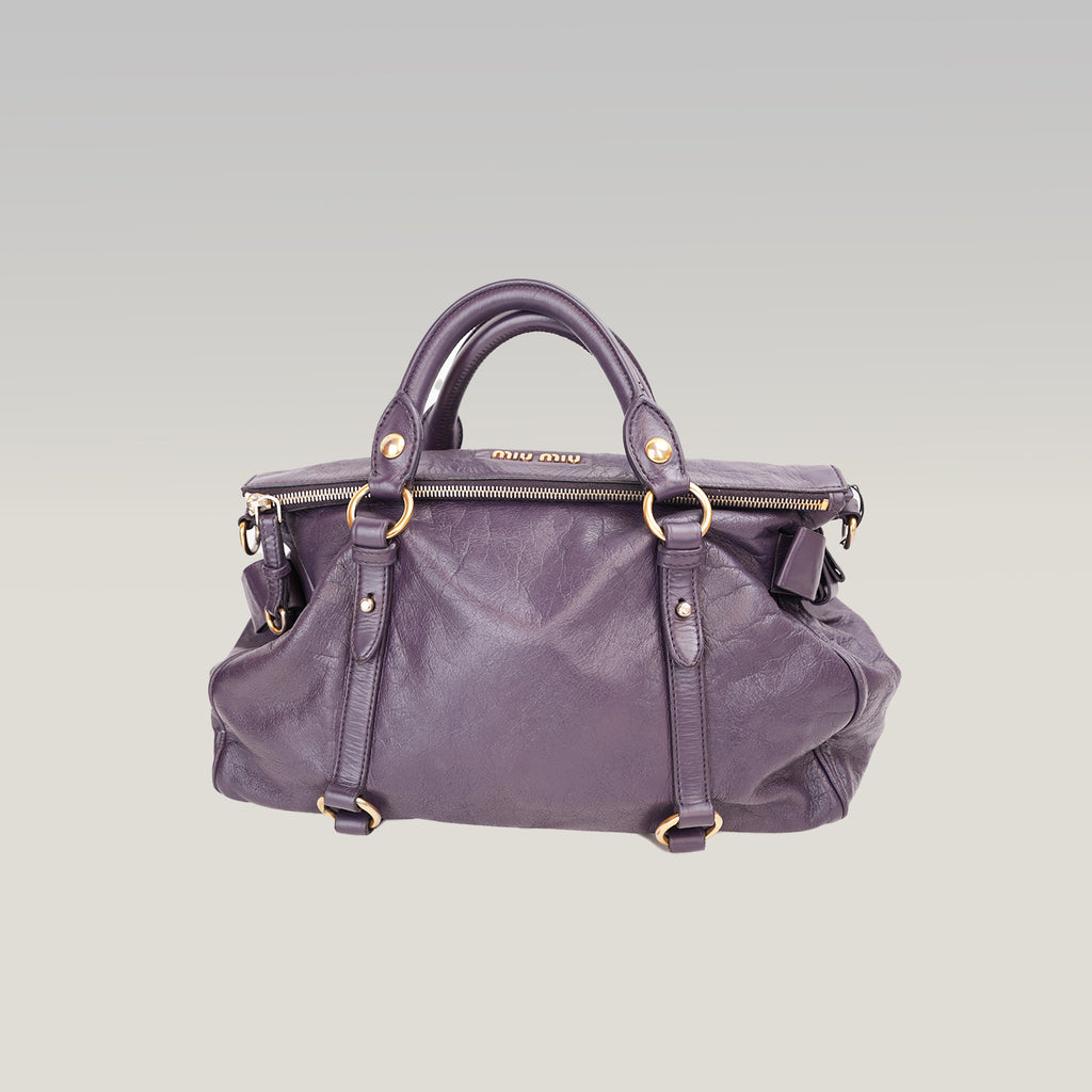 Miu Miu Vitello Lux Bow Borsa a Mano in Pelle Viola Effetto Vintage con Dettagli Dorati