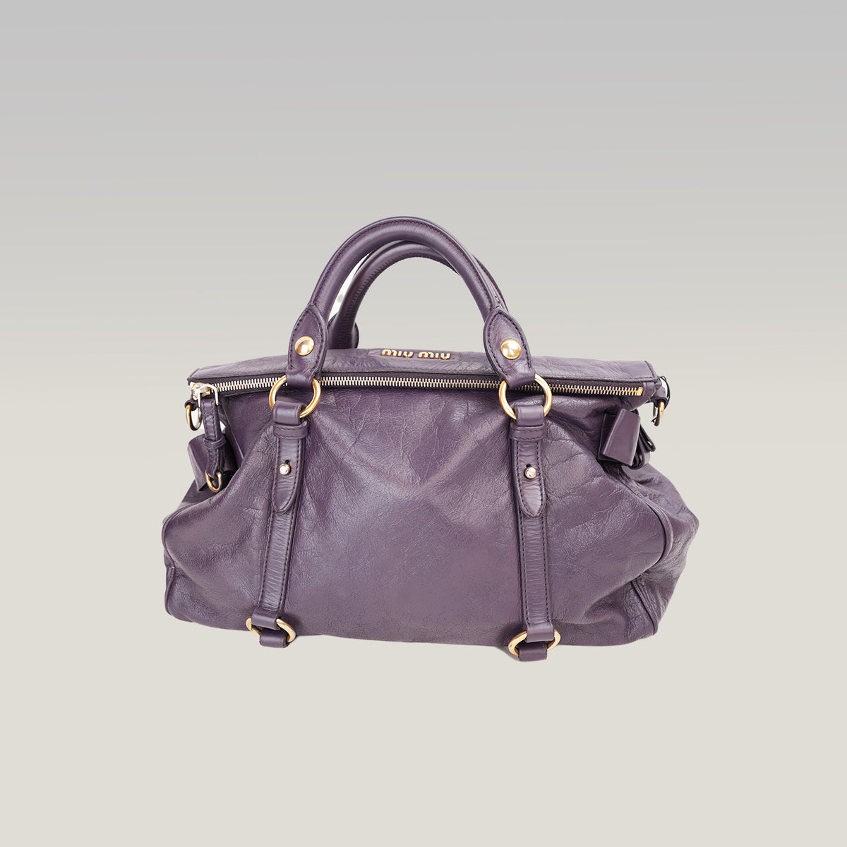 Miu Miu Vitello Lux Bow Borsa a Mano in Pelle Viola Effetto Vintage con Dettagli Dorati