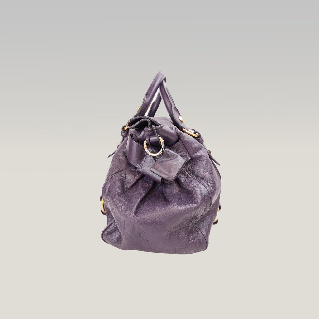 Miu Miu Vitello Lux Bow Borsa a Mano in Pelle Viola Effetto Vintage con Dettagli Dorati