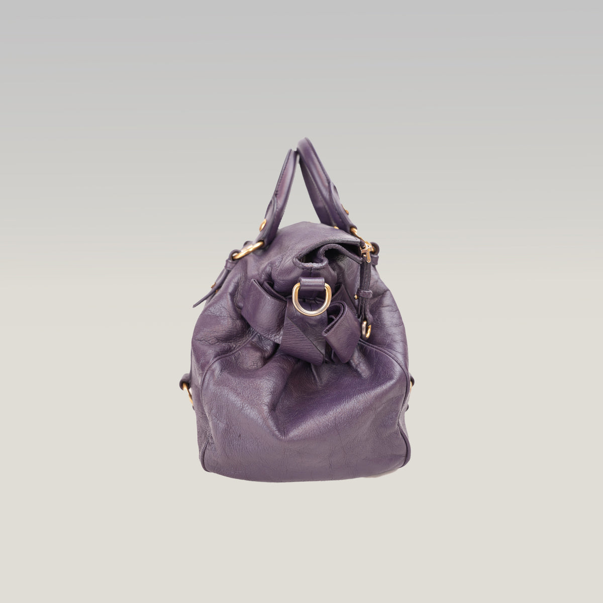 Miu Miu Vitello Lux Bow Borsa a Mano in Pelle Viola Effetto Vintage con Dettagli Dorati