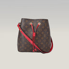 Louis Vuitton NéoNoé MM Monogram in Tela Cerata Marrone con Dettagli Rossi