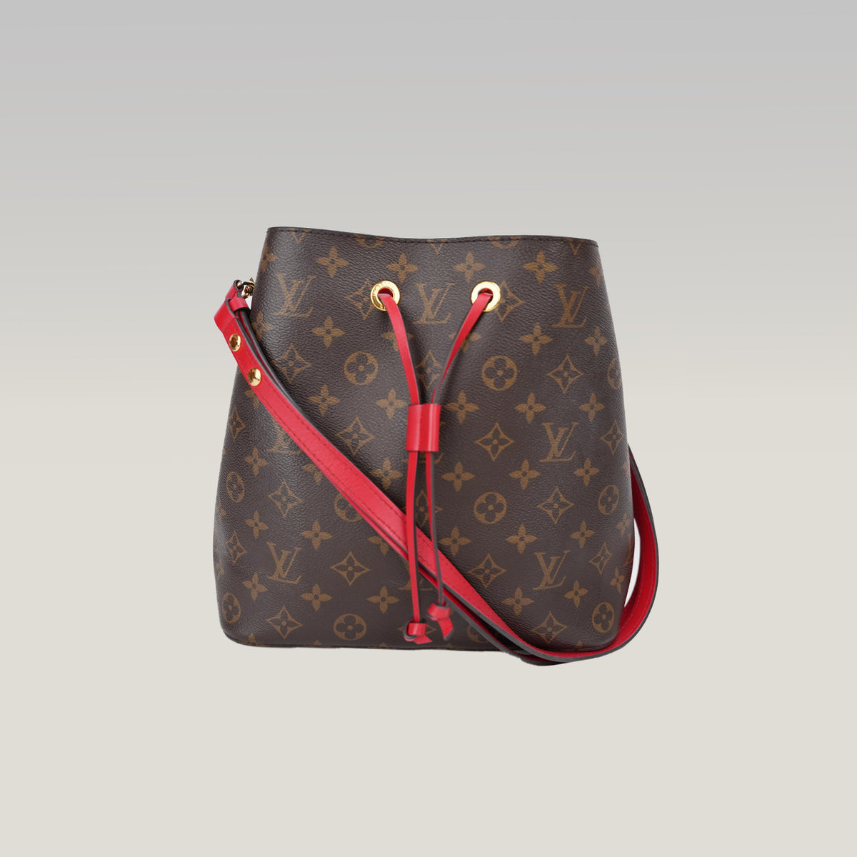 Louis Vuitton NéoNoé MM Monogram in Tela Cerata Marrone con Dettagli Rossi