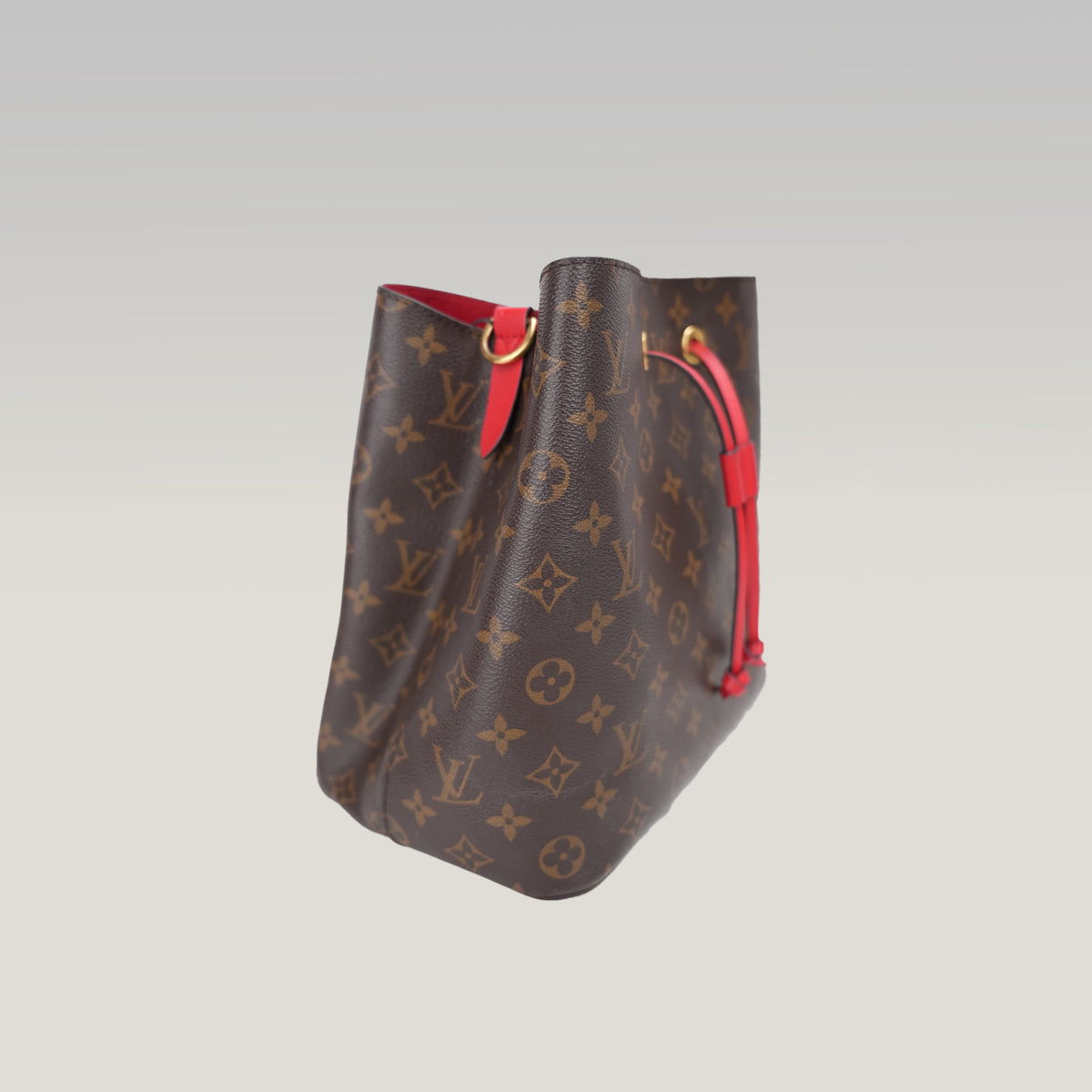 Louis Vuitton NéoNoé MM Monogram in Tela Cerata Marrone con Dettagli Rossi