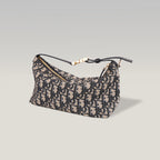 Dior DiorTravel Nomad Medium in Tela Oblique con Pelle e Dettagli in Pelle Nera