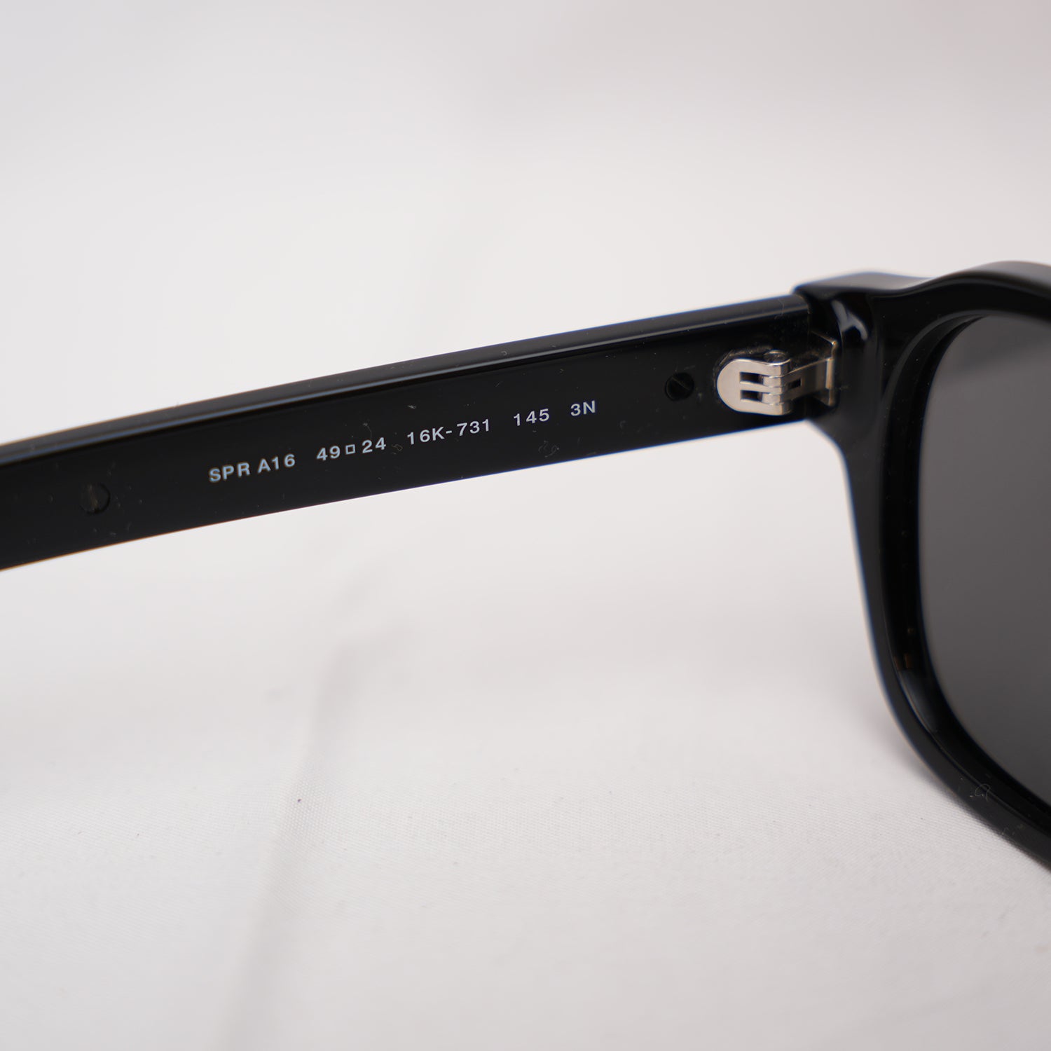Prada 0PR A16S Black Acetate Sunglasses Silver Logo Grey Lenses