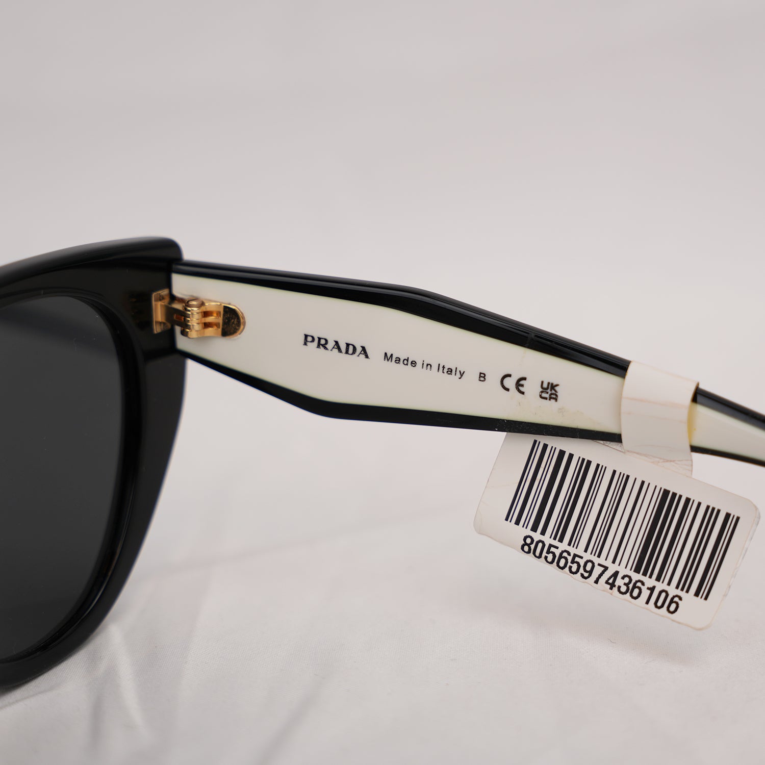 Prada PR  Cat Eye Sunglasses in Black & White