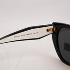 Prada PR  Cat Eye Sunglasses in Black & White