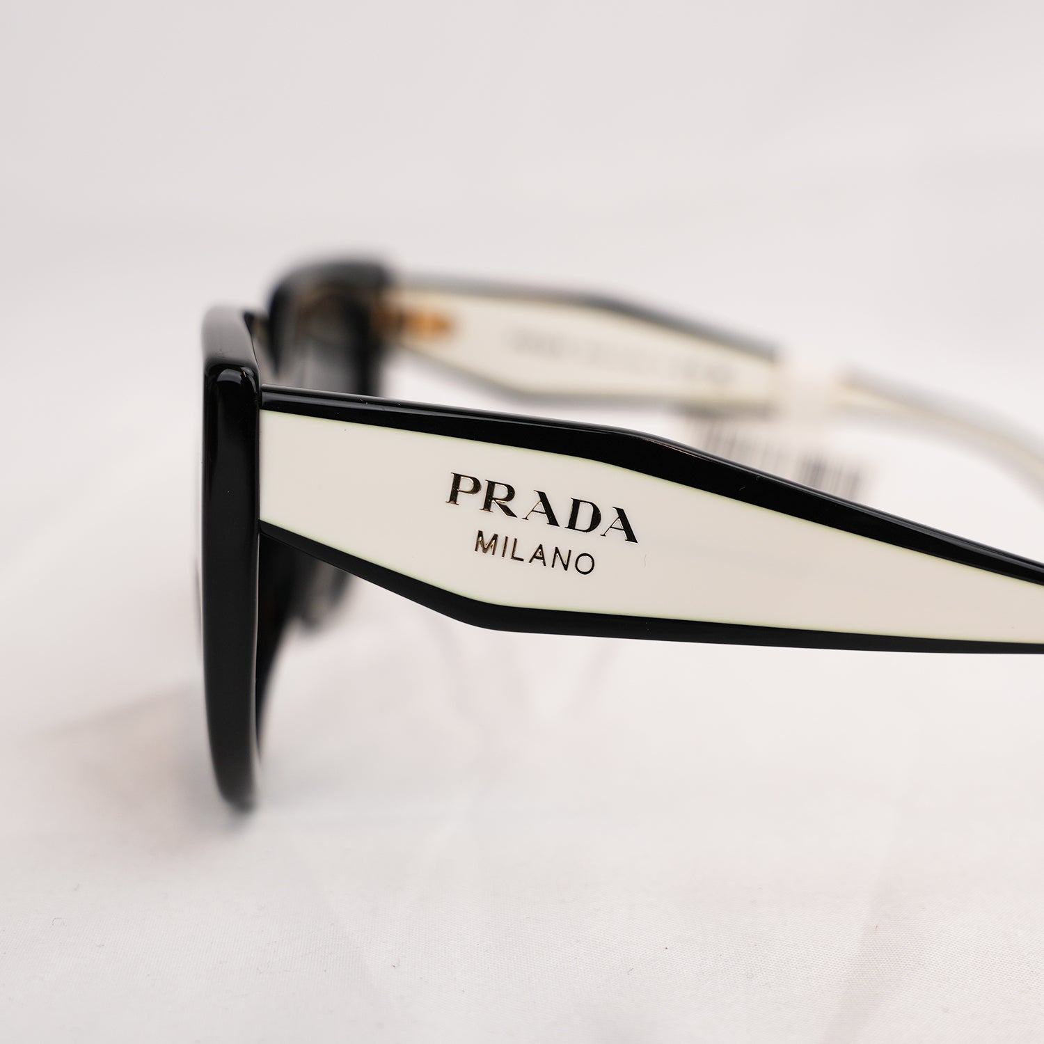 Prada PR  Cat Eye Sunglasses in Black & White