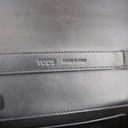 Tod’s Timeless Black Leather Micro Flap Bag con T Logo Oro
