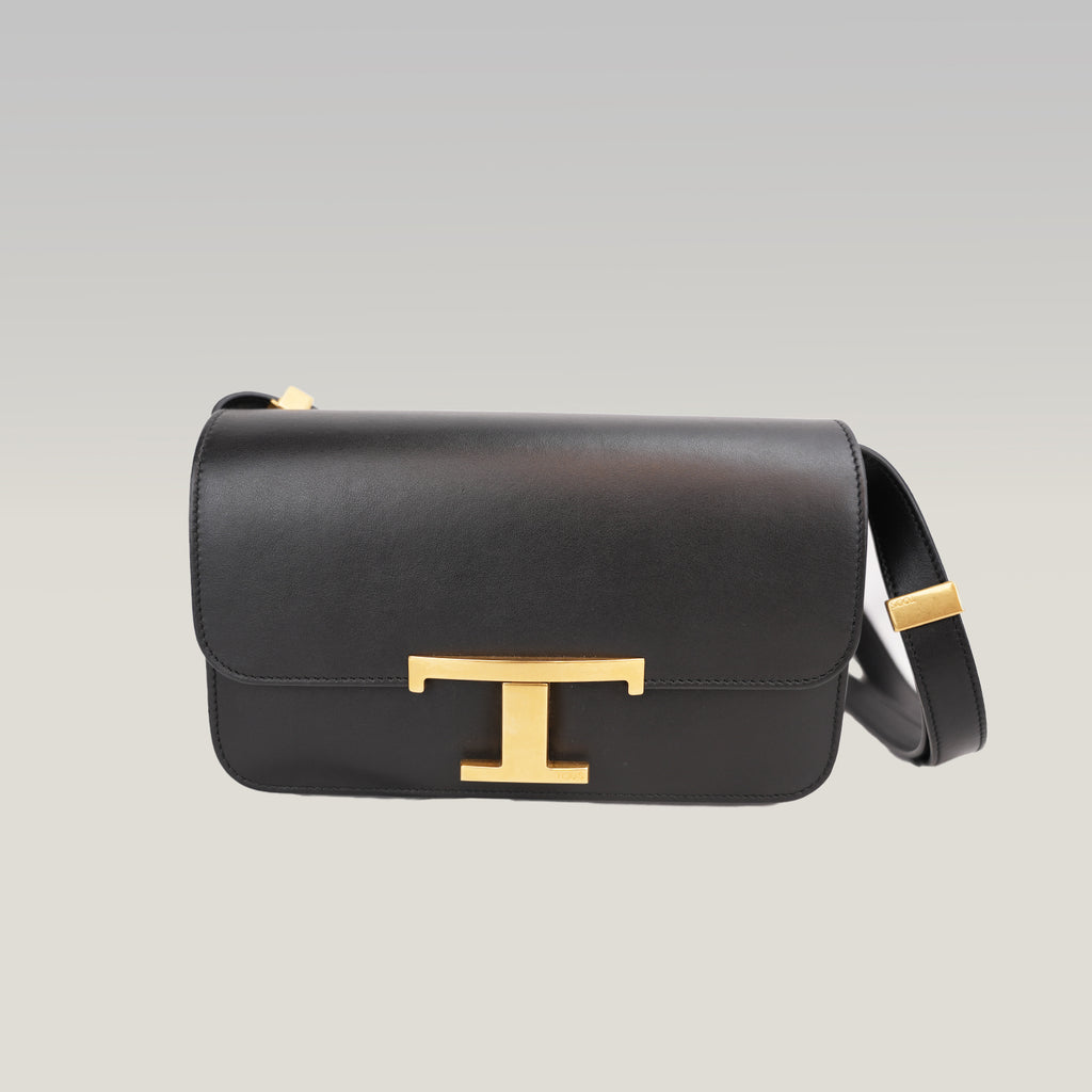 Tod’s Timeless Black Leather Micro Flap Bag con T Logo Oro