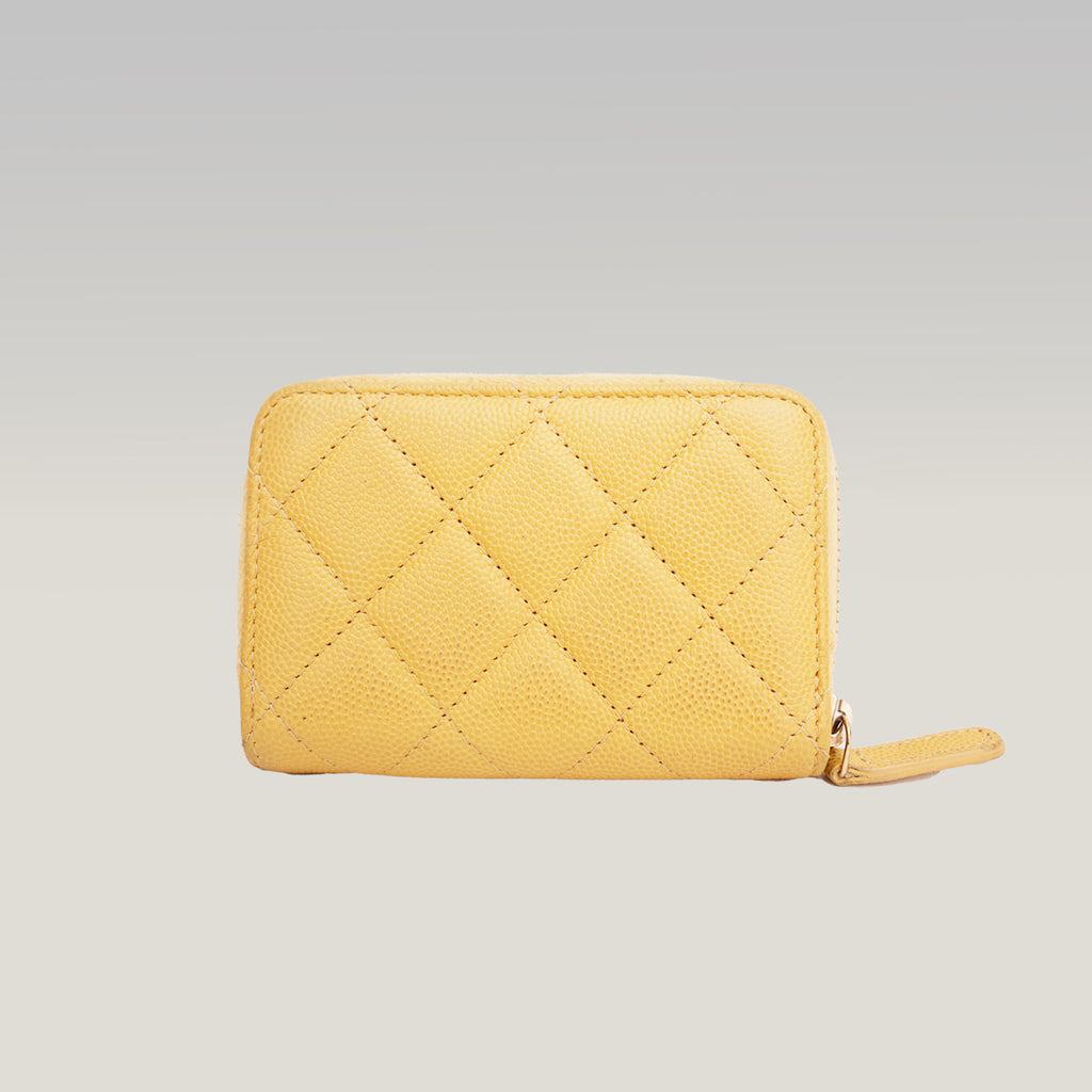 Portafoglio CHANEL in pelle trapuntata gialla con zip