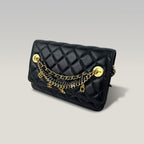 Chanel WOC Nero in Pelle di Agnello Matelassé con Catena Decorativa e Hardware Dorato