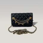 Chanel WOC Nero in Pelle di Agnello Matelassé con Catena Decorativa e Hardware Dorato