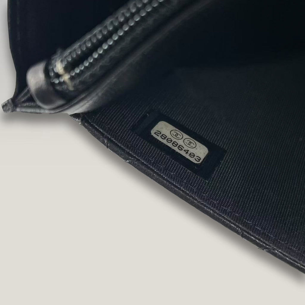 Chanel WOC Nero in Pelle di Agnello Matelassé con Catena Decorativa e Hardware Dorato