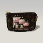 Louis Vuitton Monogram I Rue Scribe Paris Pochette Accessoires Canvas Marrone – Mini Borsa Donna 15 cm