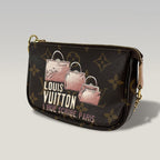 Louis Vuitton Monogram I Rue Scribe Paris Pochette Accessoires Canvas Marrone – Mini Borsa Donna 15 cm