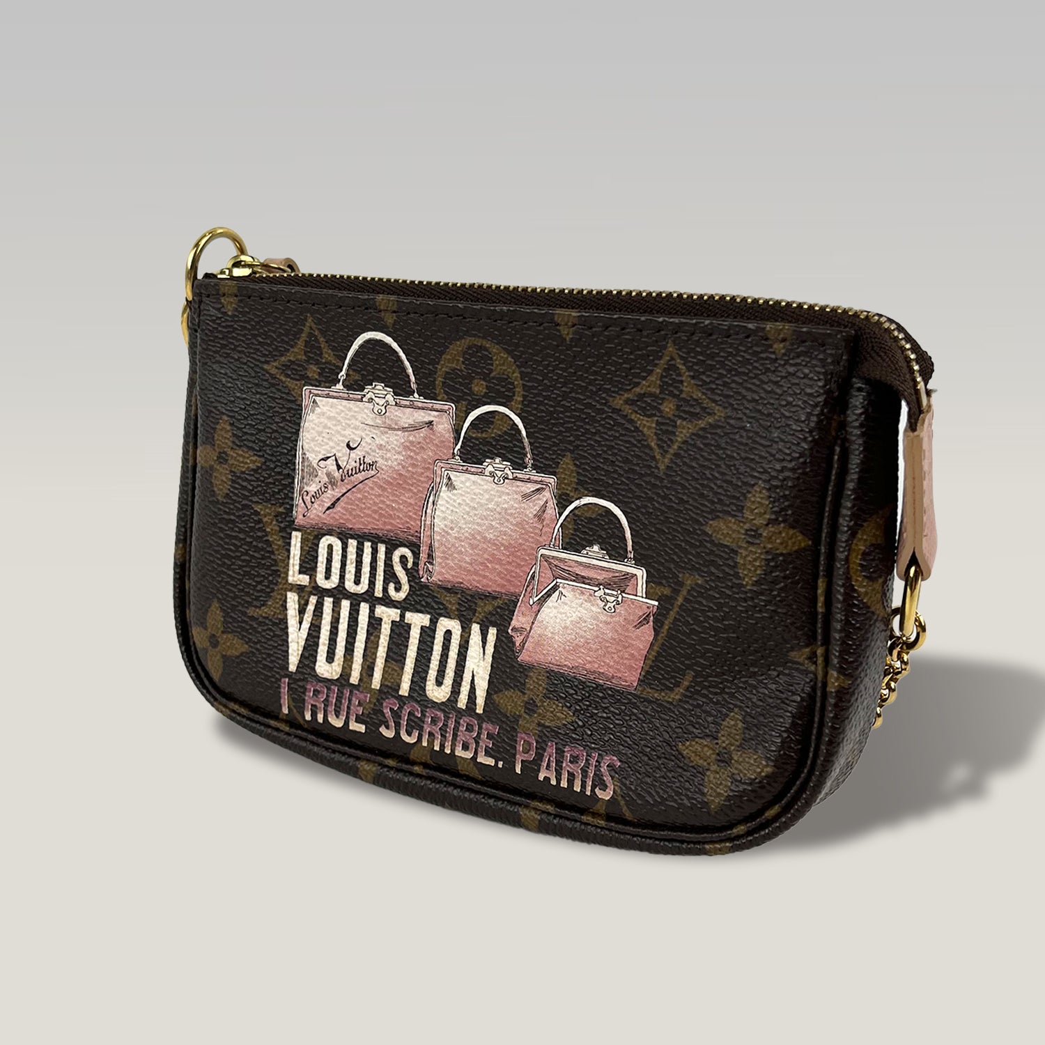 Louis Vuitton Monogram I Rue Scribe Paris Pochette Accessoires Canvas Marrone – Mini Borsa Donna 15 cm
