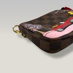 Louis Vuitton Vivienne A Paris Mini Pochette Accessoires Damier Ebene Limited Edition Canvas Marrone 15 cm