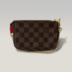 Louis Vuitton Vivienne A Paris Mini Pochette Accessoires Damier Ebene Limited Edition Canvas Marrone 15 cm
