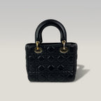 DIOR Lady Dior Piccola Nera in Pelle Cannage con Hardware Dorato e Charm D.I.O.R.