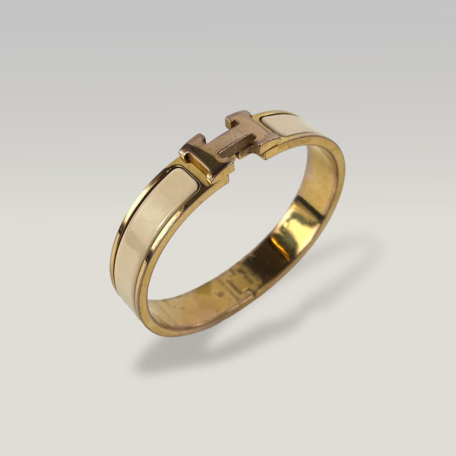 HERMÈS Bracciale Clic Clac H GM Oro e Bianco Smalto