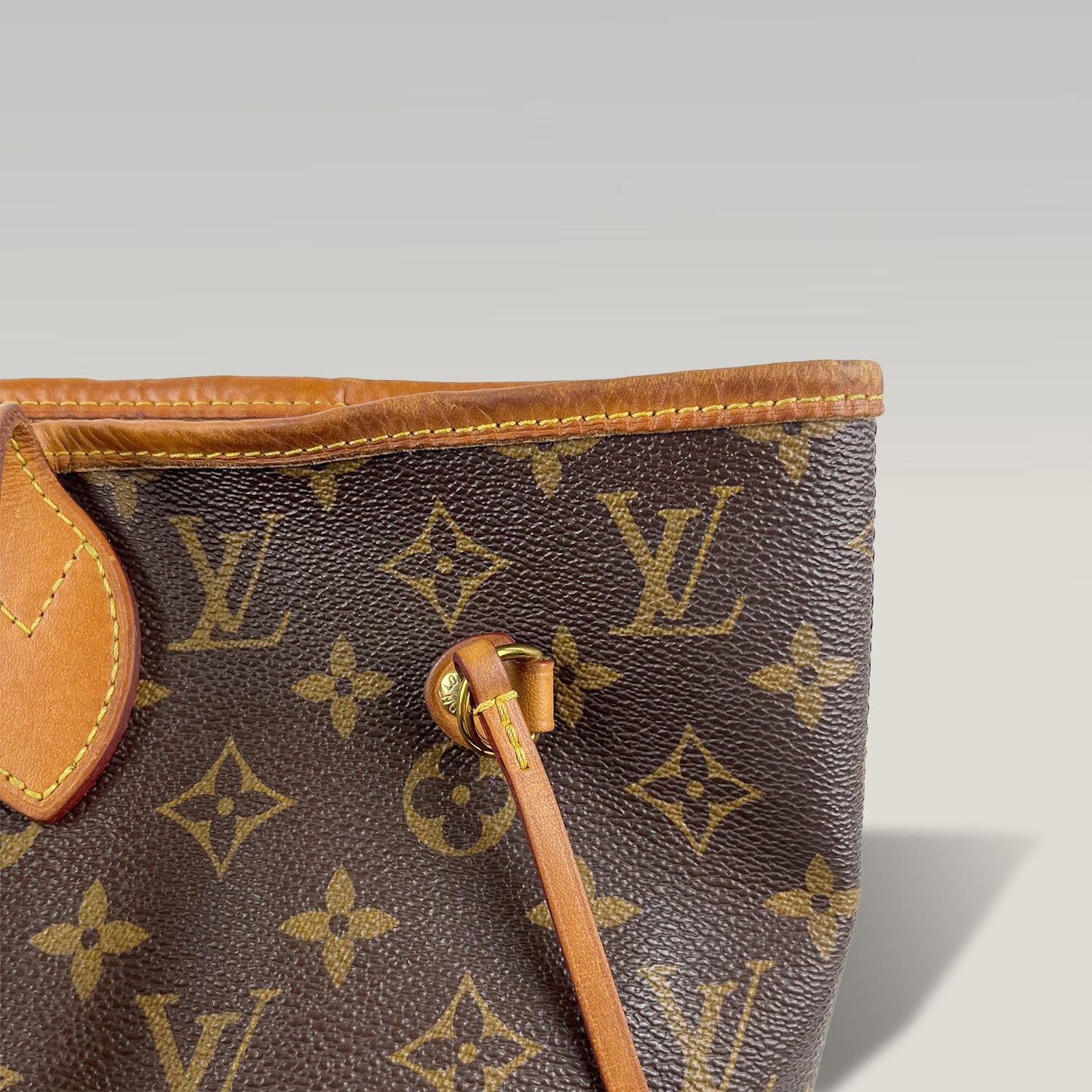 Louis Vuitton Neverfull MM Monogram in Tela Canvas Marrone con Interno Arancione