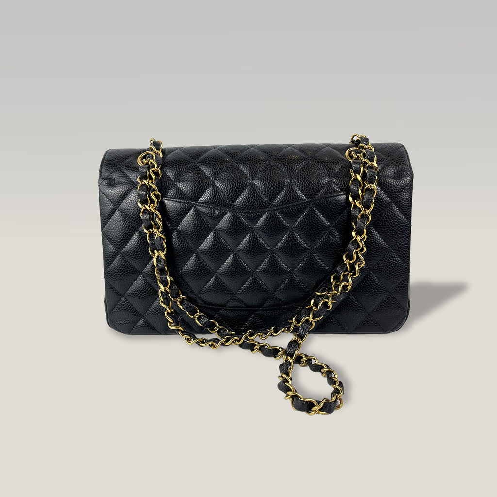 Chanel Medium Classic Flap Bag Nera in Pelle Caviar Trapuntata