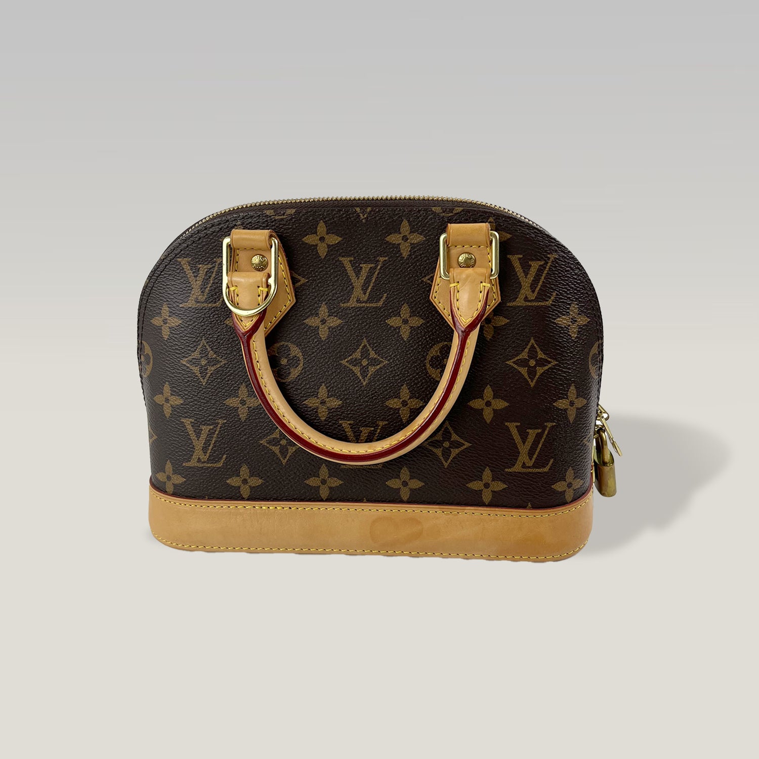 LOUIS VUITTON Alma BB Monogram con Pelle Naturale