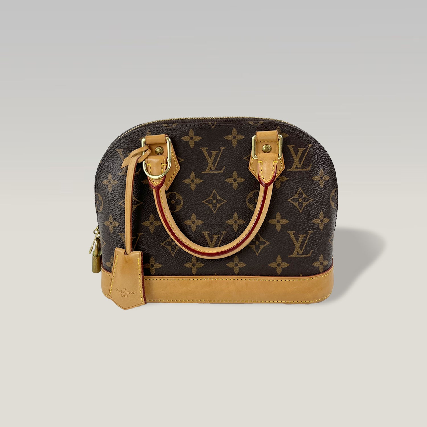 LOUIS VUITTON Alma BB Monogram con Pelle Naturale