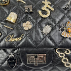 Chanel 2.55 Reissue Medium Bag Nera in Pelle Trapuntata con Metalleria Grigia