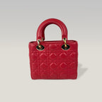 Dior Lady Dior Small Rossa in Pelle Cannage con Charm D.I.O.R.