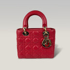 Dior Lady Dior Small Rossa in Pelle Cannage con Charm D.I.O.R.