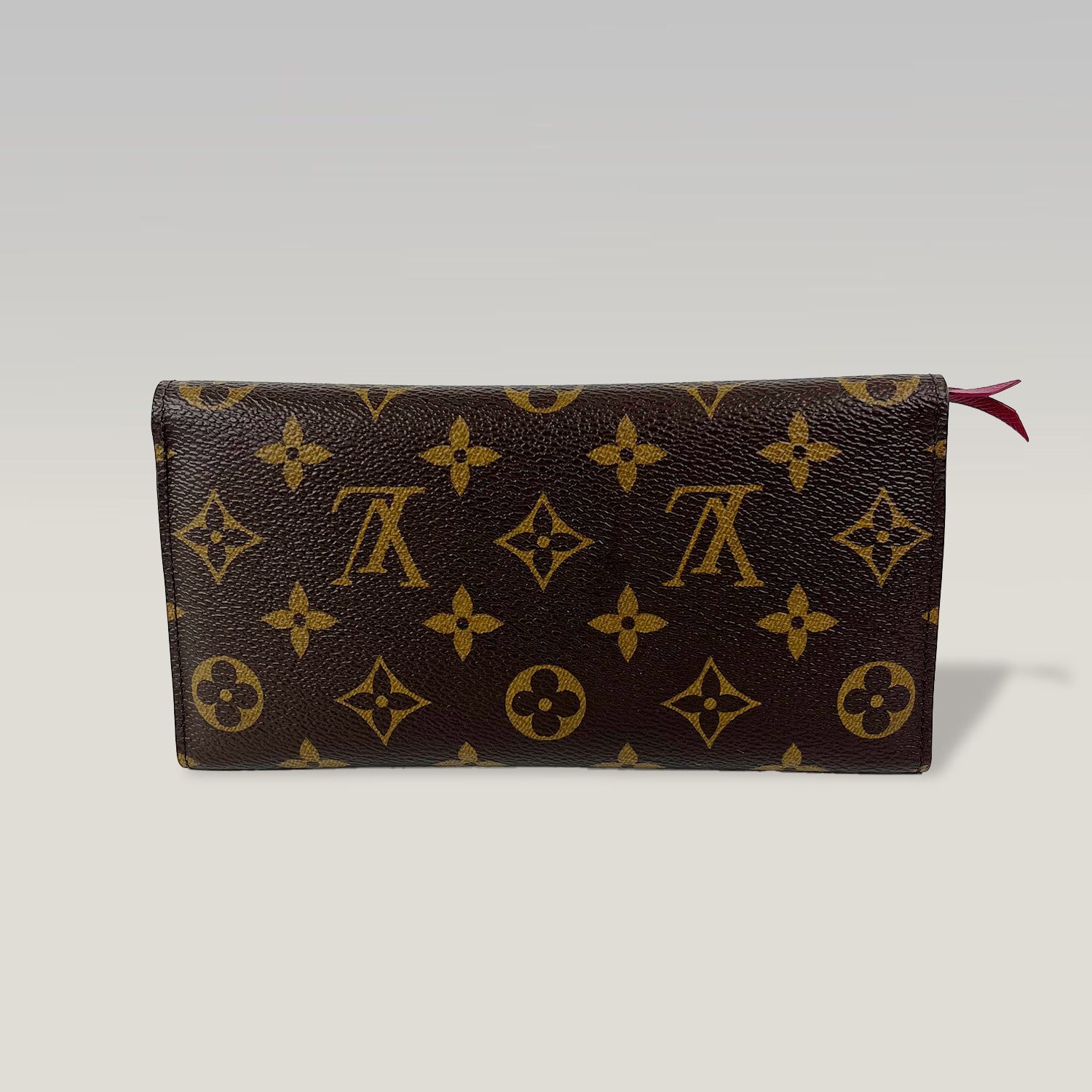 Louis Vuitton portafoglio Monogram con bottone fucsia e tasca estraibile