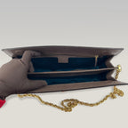 Gucci GG Supreme clutch con banda Web e catena