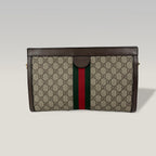 Gucci GG Supreme clutch con banda Web e catena