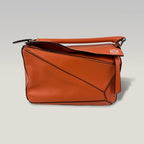 Loewe Puzzle Small Bag Orange Calfskin Leather Top Handle & Crossbody Bag