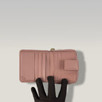 Gucci GG Supreme portafoglio corto con zip – canvas monogram e pelle rosa