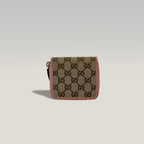 Gucci GG Supreme portafoglio corto con zip – canvas monogram e pelle rosa