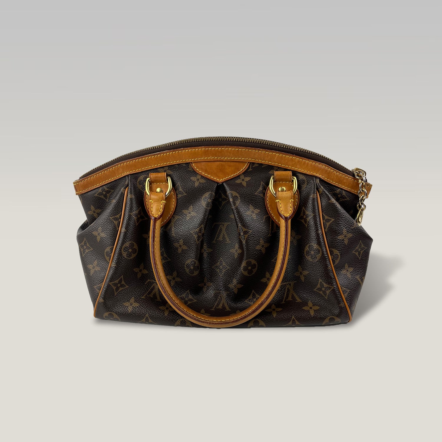 Louis Vuitton Tivoli PM in Tela Monogram con Finiture in Vacchetta