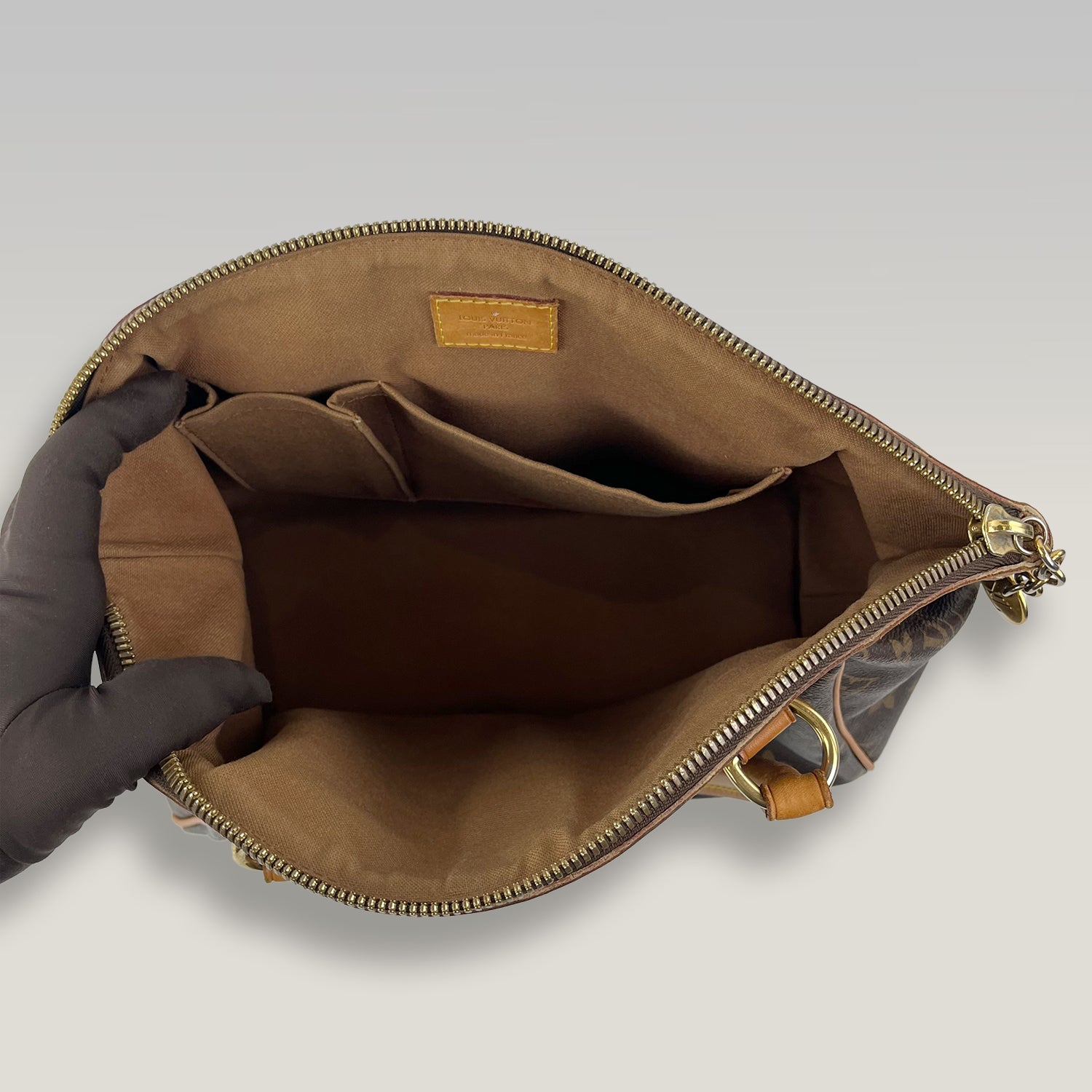 Louis Vuitton Tivoli PM in Tela Monogram con Finiture in Vacchetta