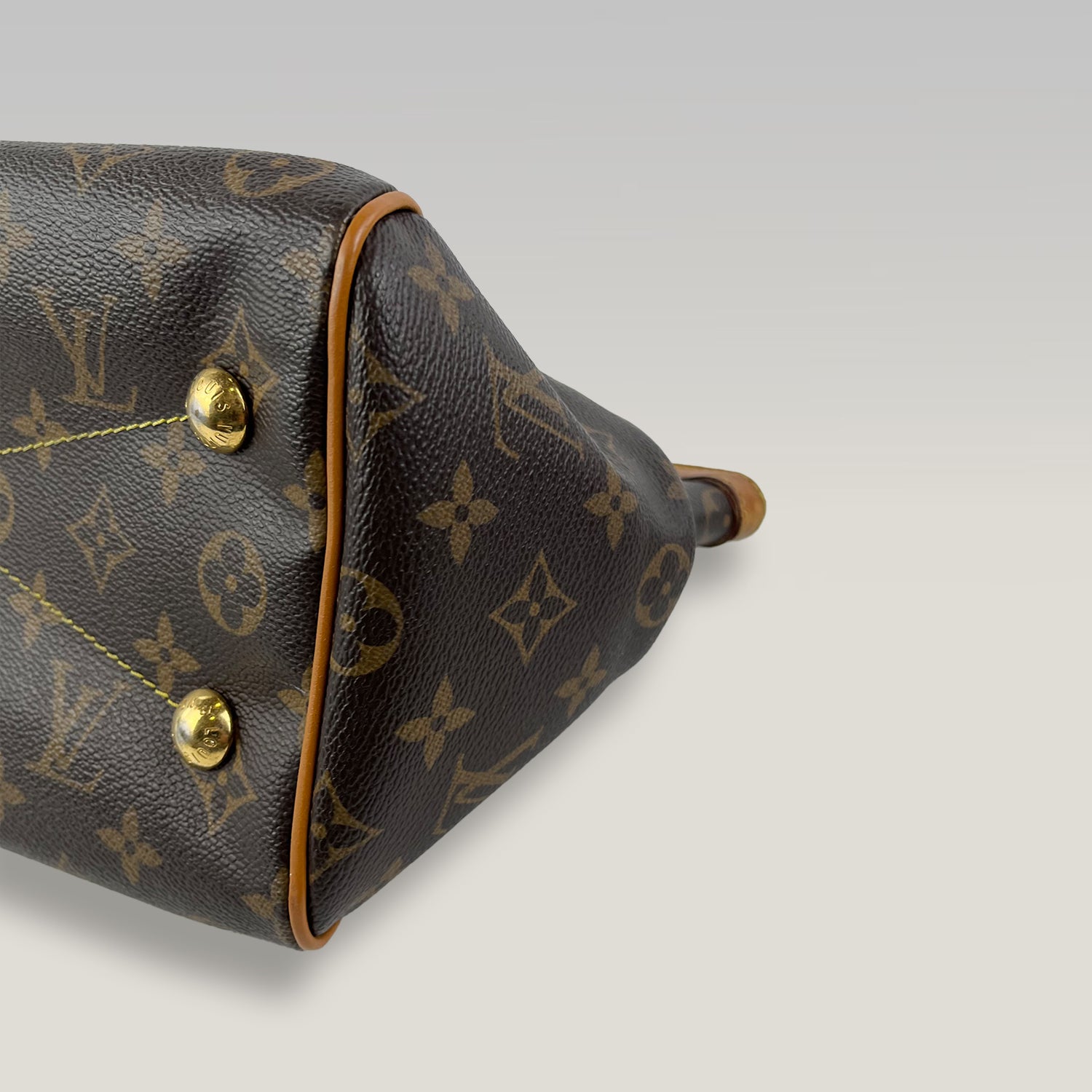 Louis Vuitton Tivoli PM in Tela Monogram con Finiture in Vacchetta