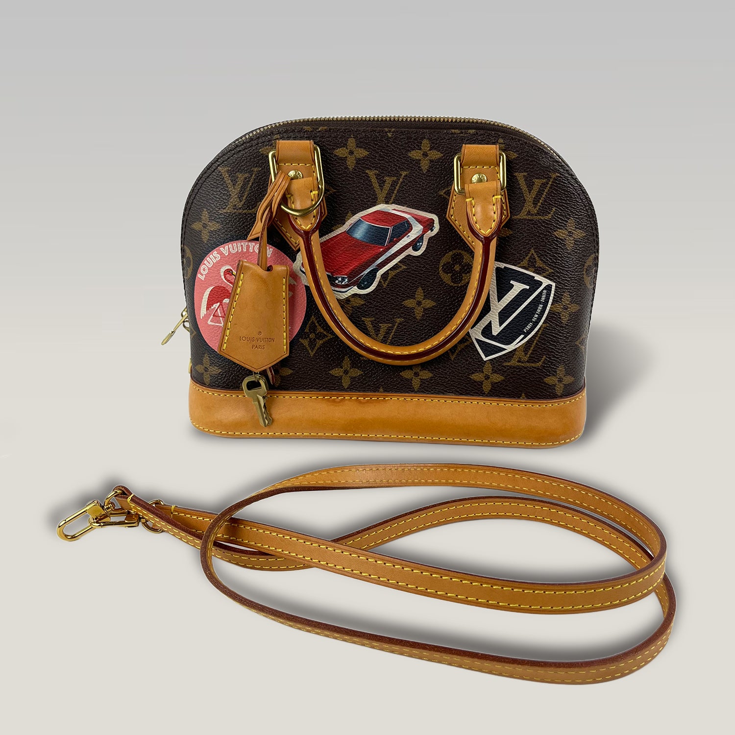 Louis Vuitton Alma BB Monogram Canvas Travel Stickers Top Handle & Crossbody Bag
