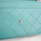 Chanel WOC Classica Azzurro Turchese in Pelle di Agnello Trapuntata con Hardware Argento e Carta di Autenticità